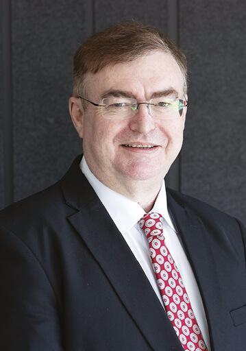 Chief Corporate Officer, Simon Ash